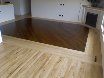 Maple border with Ipe (Brazilian Walnut) laid on the diagonal in the center in Iowa City