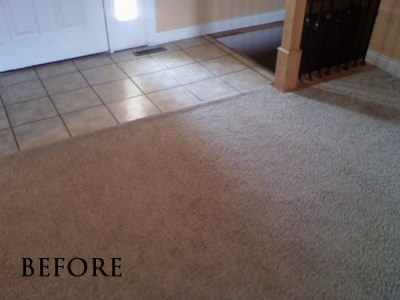 Tile in foyer, carpet in living room